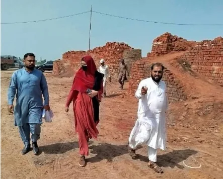 Assistant Commissioner Dr. Haleema Munir conducts surprise inspection of a brick kiln in Chak 124 RB, mandating strict compliance with environmental regulations.