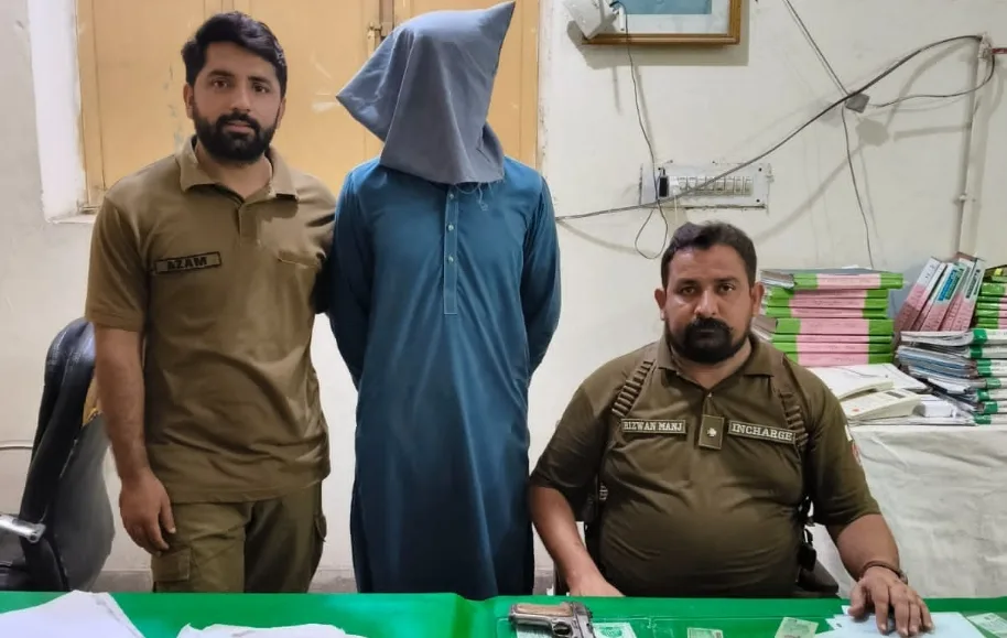 Pansera Outpost Police arrest youth for displaying weapons and firing 